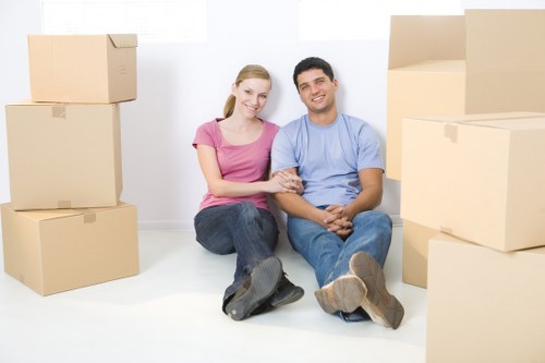 Packed moving boxes ready for removals in Whitton