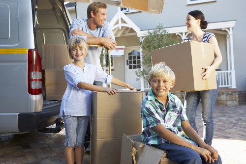Packed boxes and labeled containers for household storage in Whitton